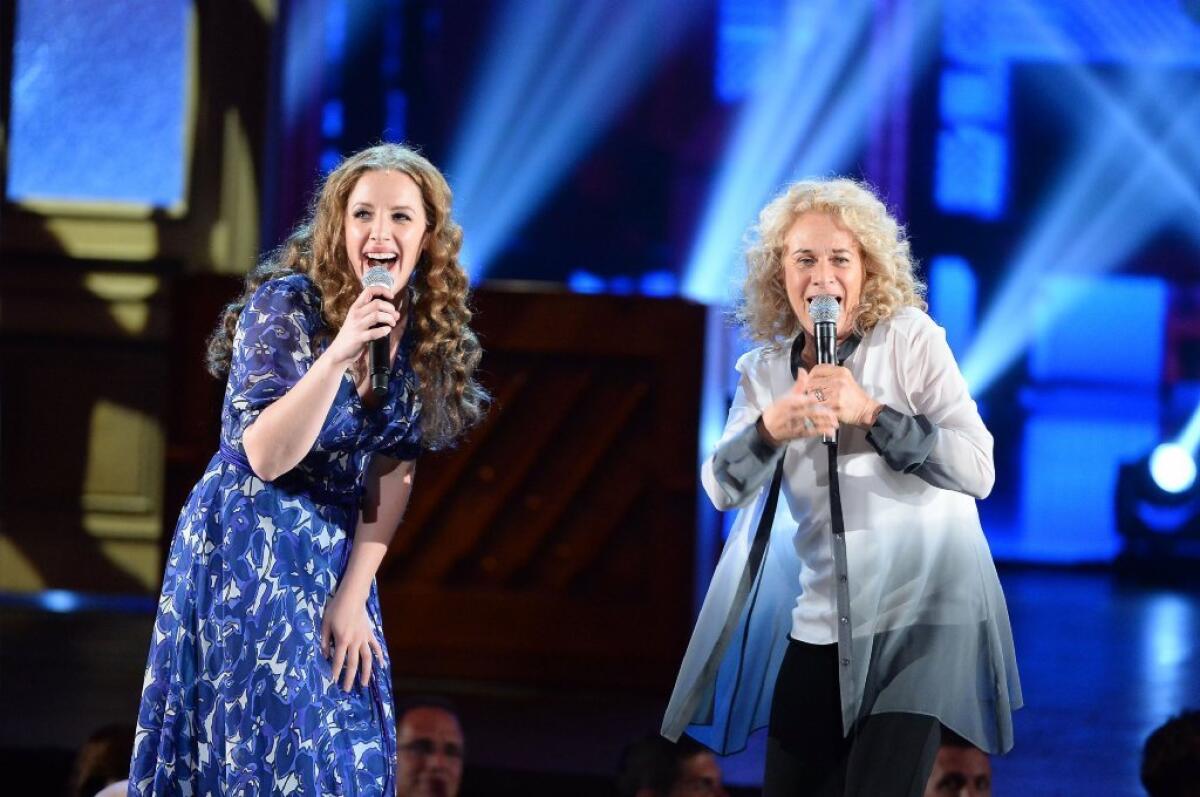 Jessie Mueller, left, and Carole King sing "I Feel the Earth Move" at the Tony Awards ceremony