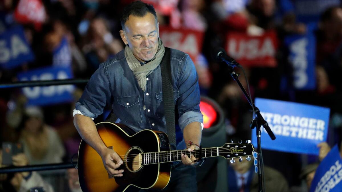 Bruce Springsteen performs at a Clinton rally on Philadelphia's Independence Mall on Nov. 7.