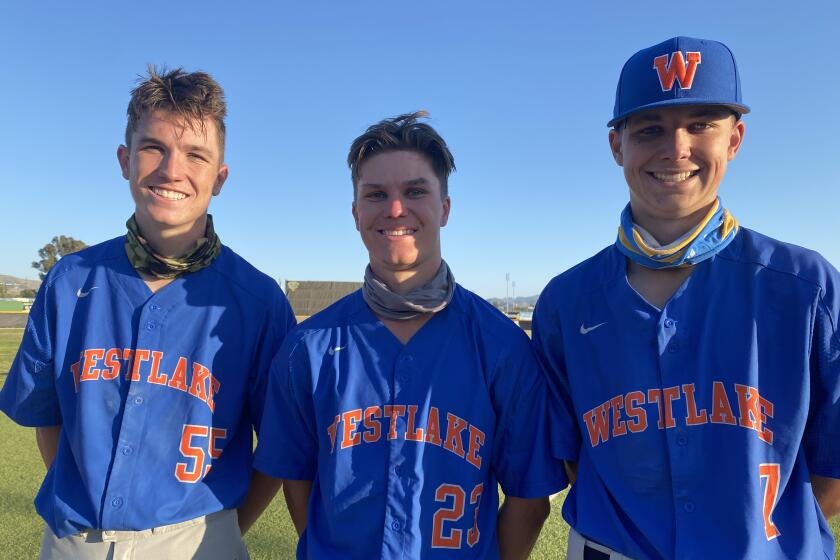 Jack Johnson (middle) with freshman twin brothers Nolan (left) and Nate. All three start for Westlake's baseball team.