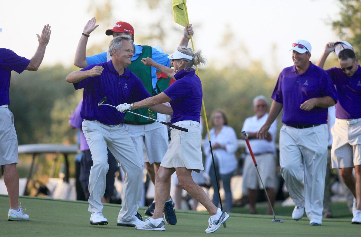 Shady Canyon Country Club, including captain Brian Gunson, shown parparing to hug Robyn Puckett after her birdie putt clinched the 2014 Jones Cup title, hopes to top the five local clubs competing on Wednesday at Newport Beach Country Club.