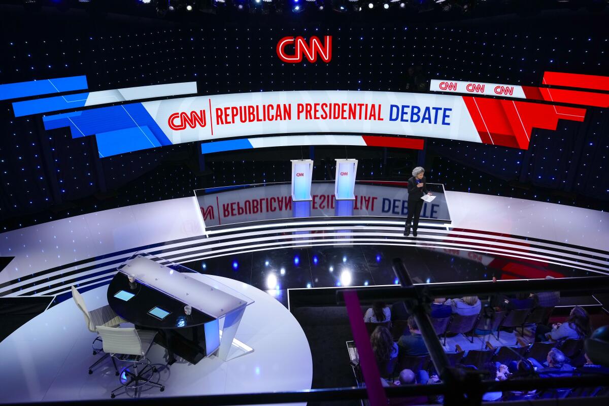 The CNN debate stage, with moderator chairs and two lecterns