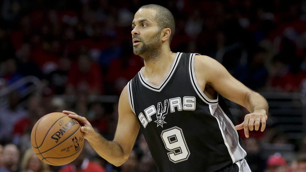 San Antonio Spurs guard Tony Parker dribbles the ball during the first half of a 107-92 loss to the Clippers in Game 1 of the NBA Western Conference quarterfinals at Staples Center on April 19.