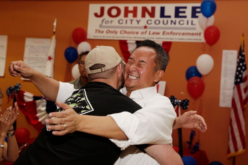 PORTER RANCH, CALIF. - AUGUST 14, 2019: Longtime friend Erich King picks up newly elected Councilman John Lee during his election night the Los Angeles City Council District 12 on Wednesday, Aug. 14, 2019 in Porter Ranch, Calif. “His whole life has been about city twelve, and his goal is to represent this community,” King says. “That’s why we’re on his side.” (Liz Moughon / Los Angeles Times)