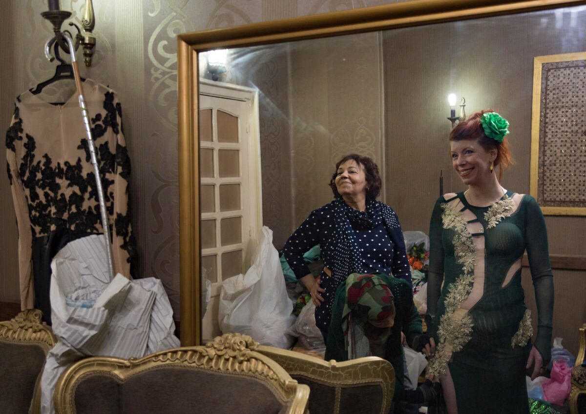 Eman Zaki, 60, left, during a fitting for American belly dancer Alison Trow, 49 in Zaki's workshop in Cairo, Egypt January 4, 2019. This is the first time Trow comes to Egypt to purchase costumes and visit the country.