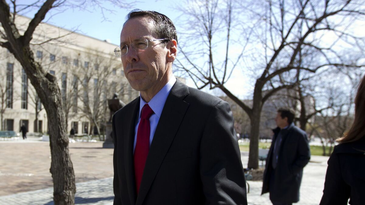 AT&T Inc. Chief Executive Randall Stephenson leaves the federal courthouse in Washington in March.