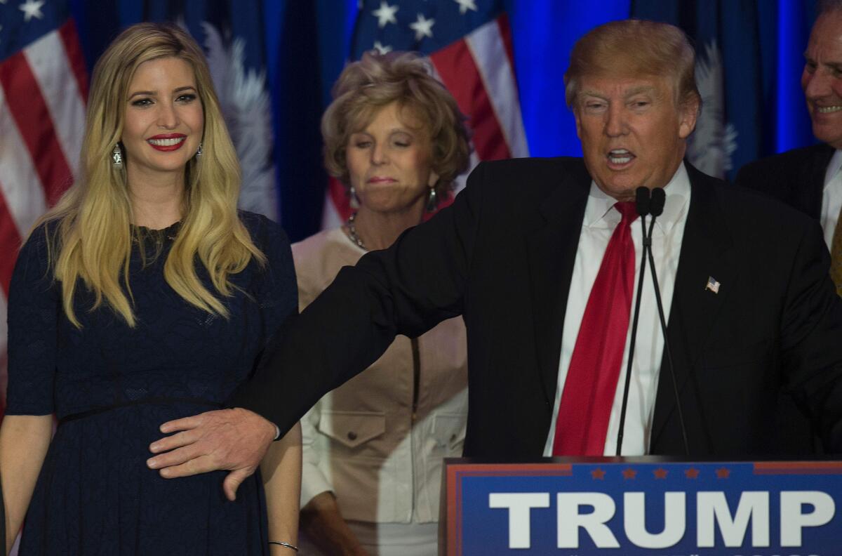 Republican presidential candidate Donald Trump pats his expecting daughter Ivanka Trump on Feb. 20 while celebrating victory in the South Carolina primary in Spartanburg. Ivanka gave birth to a boy on Sunday.