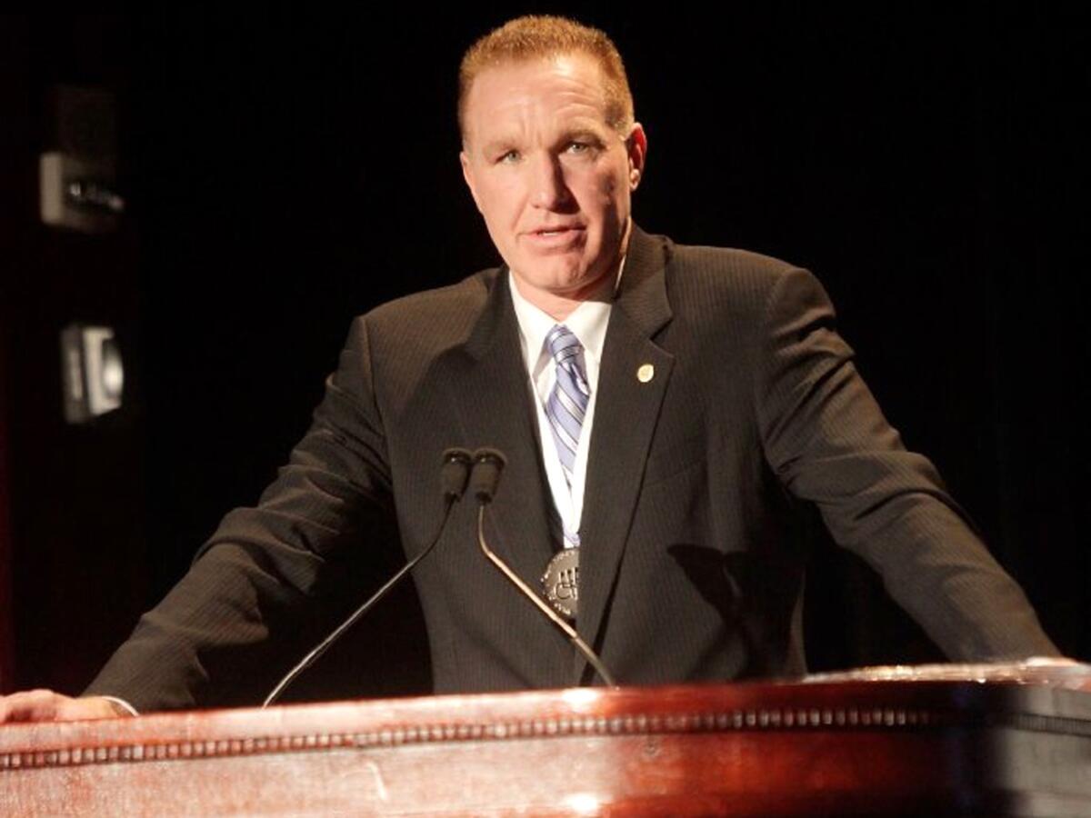 Chris Mullin, seen here speaking at the The 26th Annual Sports Legends Dinner At The Waldorf Astoria, is reportedly been hired to take over the head coaching position at his alma mater, St. John's.