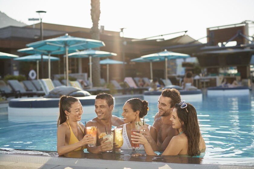 Guests sip cocktails at the Cove pool complex at Pechanga Resort Casino in Temecula.