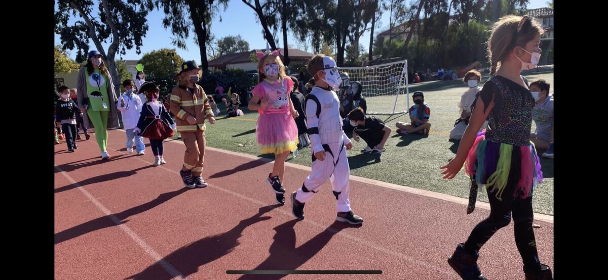 Rowe students parade on Halloween.