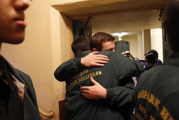 Moorpark High school students hug before the start of the Super Quiz Relay portion of the 2009 California Academic Decathlon in Sacramento.