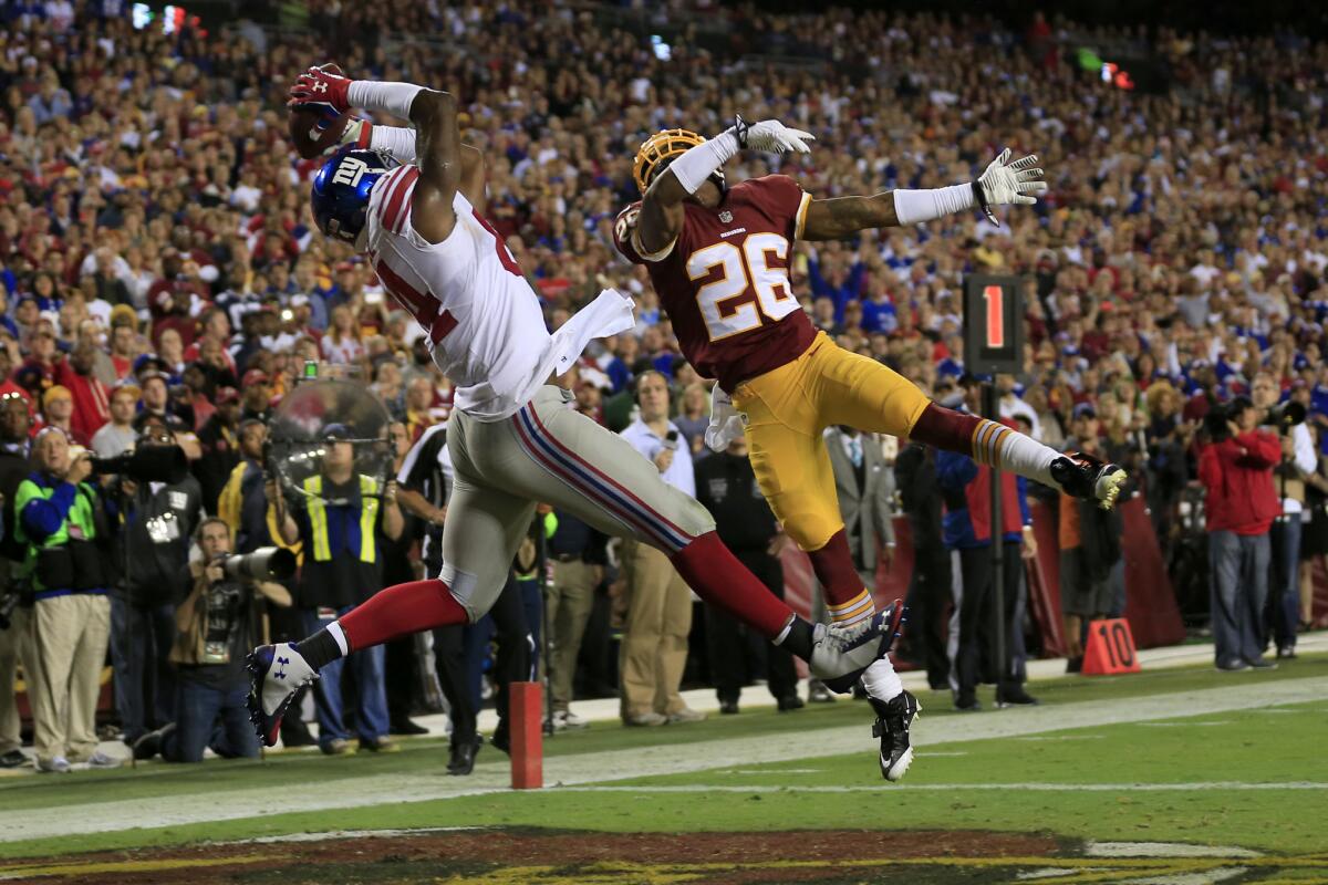New York Giants tight end Larry Donnell catches a touchdown pass against the Washington Redskins At FedExField in Landover, Md., on Sept. 25, 2014.