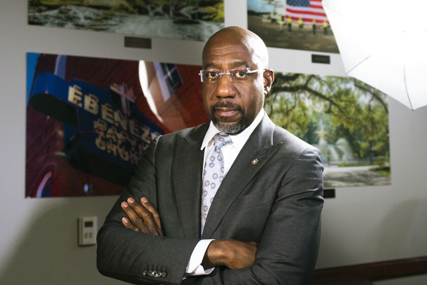 Sen. Raphael Warnock, D-Ga., poses for a photo after an interview with The Associated Press on Capitol Hill, Wednesday, Feb. 1, 2023, in Washington. (AP Photo/Manuel Balce Ceneta)