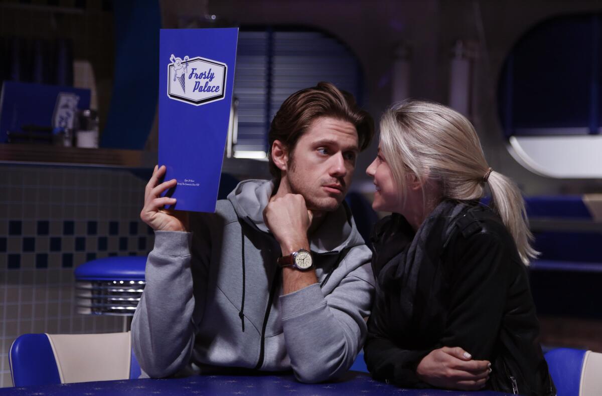 Julianne Hough, who plays Sandy, and Aaron Tveit, who plays Danny, rehearse for Fox's "Grease Live!" musical production.