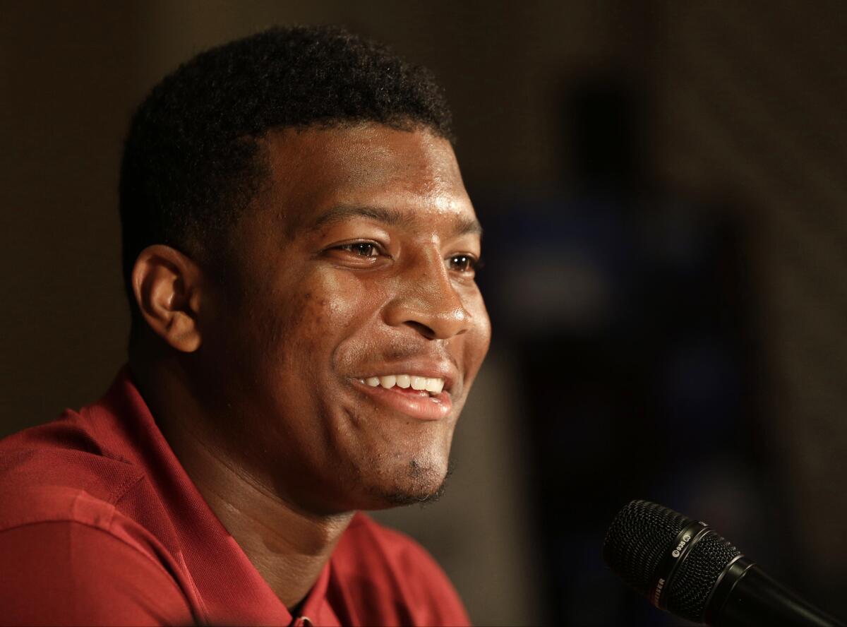 Florida State's Jameis Winston answers questions on Monday.