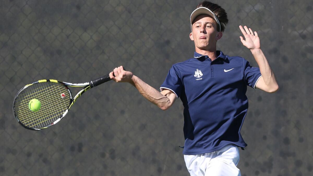 Newport Harbor's Andy Myers, shown hitting a forehand on March 15, won three matches with partner Josh Watkins on Thursday to advance in the CIF Southern Section Individuals boys' tennis tournament.