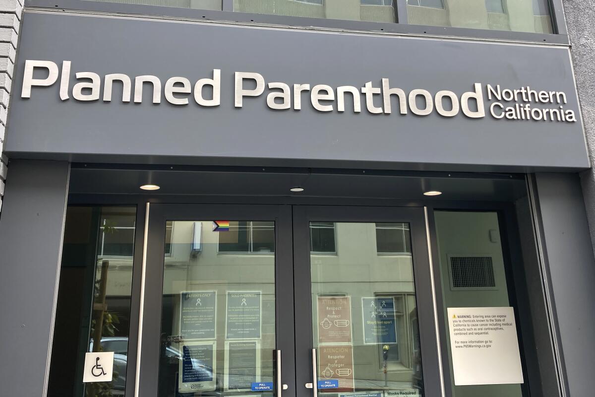 Glass entrance doors to a Planned Parenthood Northern California clinic