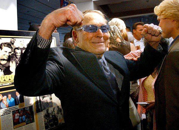 A memorial gathering in 2004 for Joe Gold, bodybuilder and gym owner, at the Del Rey Yacht Club in Marina del Rey brought LaLanne together with Arnold Schwarzenegger, background.