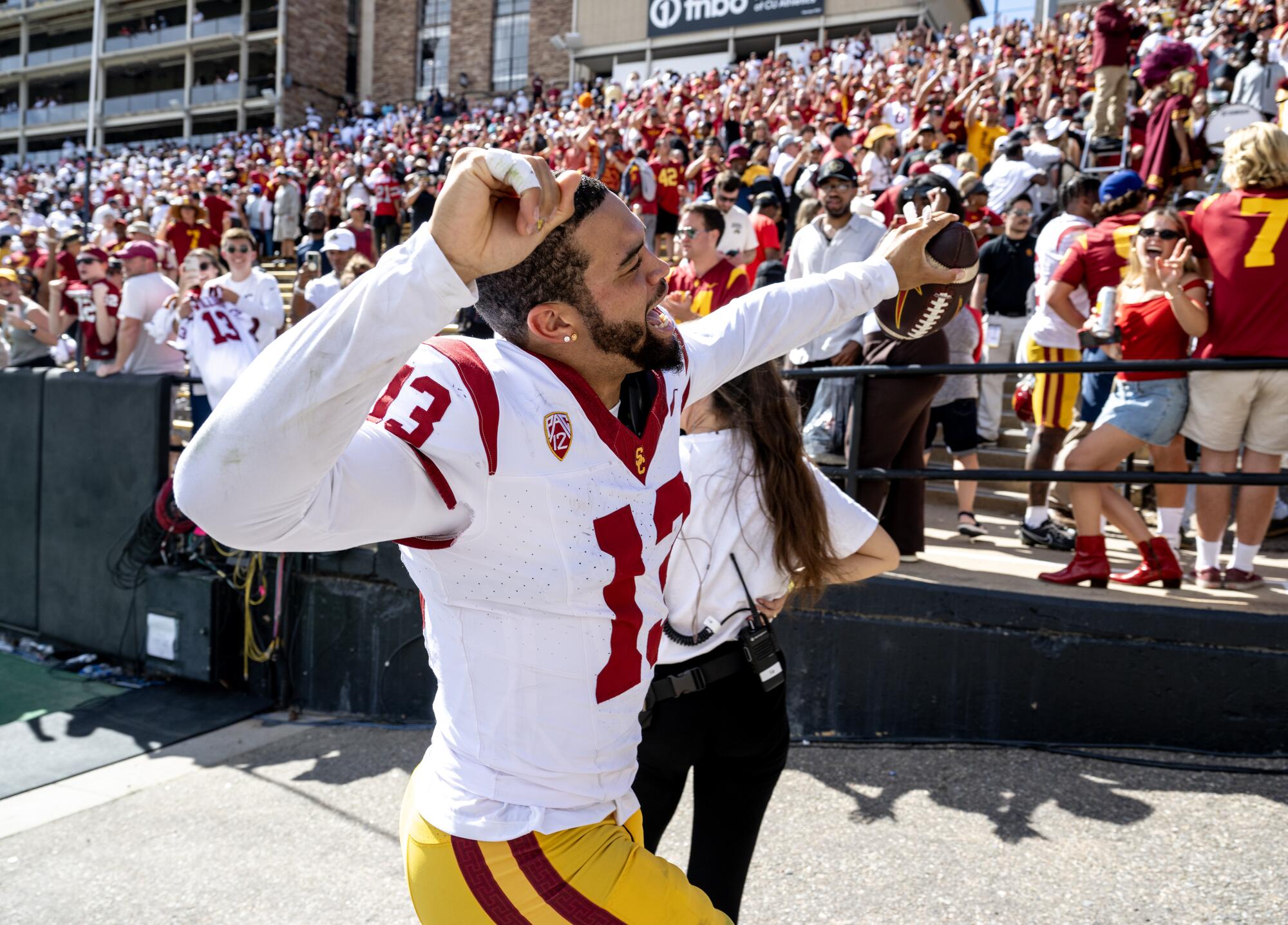 USC quarterback Caleb Williams reacts to the crowd as he leaves the field after beating Colorado at Folsom Field on Sept. 30.
