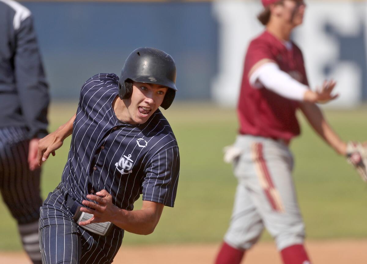 Newport Harbor's Jack Morris rounds third for home against Oaks Christian on Tuesday.