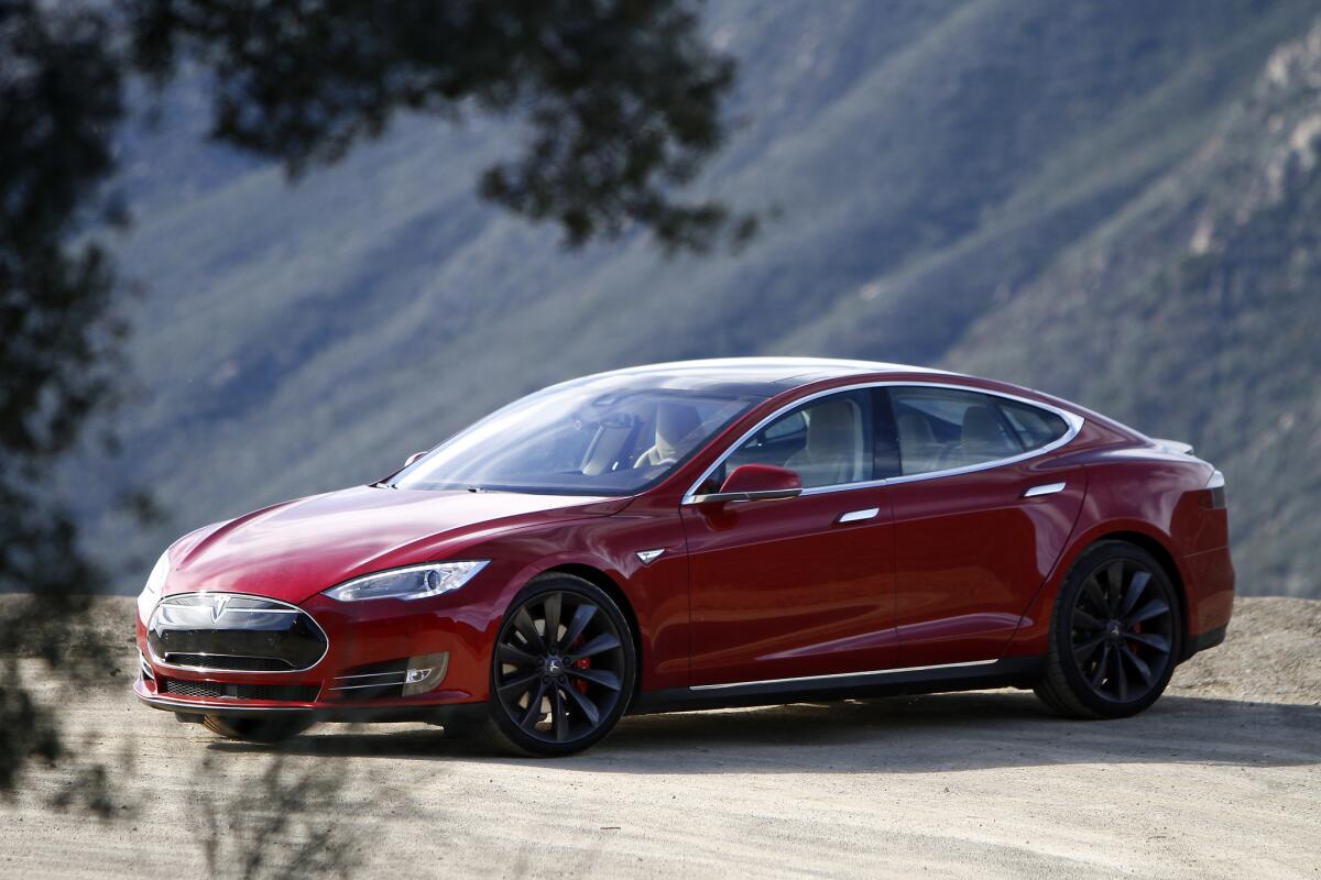 The new Tesla Model S P85D produces extra power with the addition of a second electric motor putting out the equivalent of 691 horsepower. It's priced at $104,500.