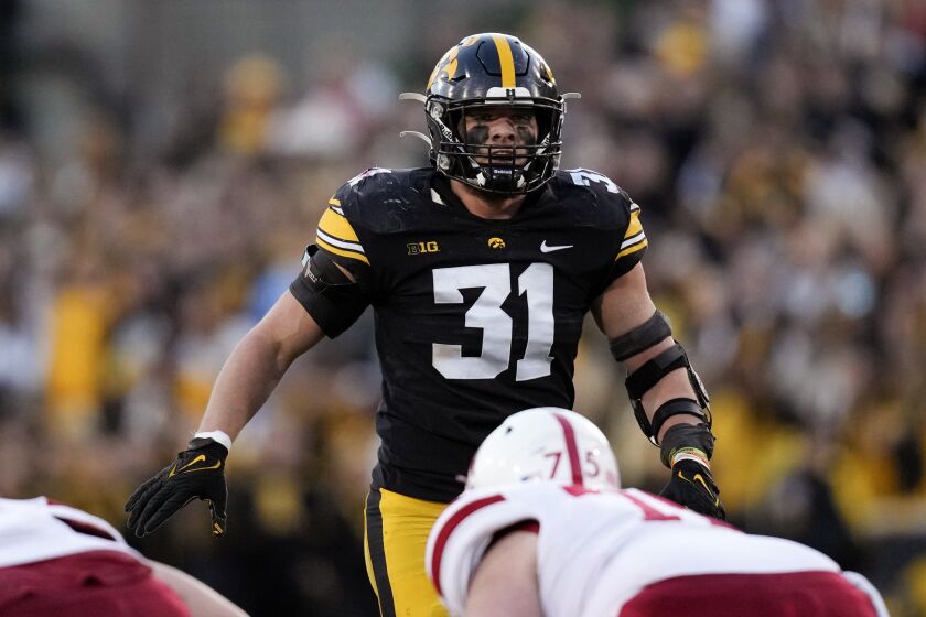 Iowa linebacker Jack Campbell (31) gets set for a play during the first half of an NCAA college football game against Nebraska, Friday, Nov. 25, 2022, in Iowa City, Iowa. (AP Photo/Charlie Neibergall)