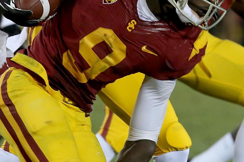 USC wide receiver Marqise Lee runs against Washington State at the Coliseum in Los Angeles.