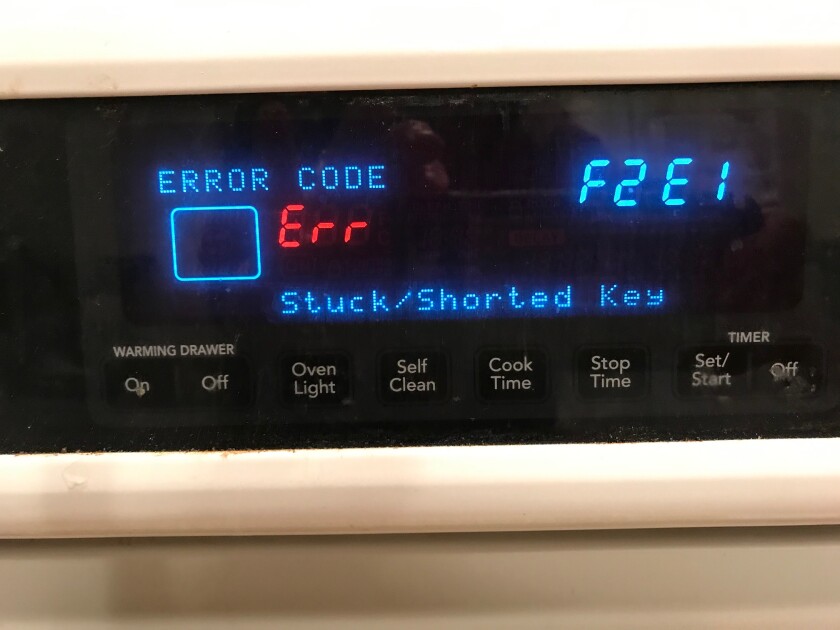This isn't what you want to see on your stove panel when no one will set foot in your house to fix it.