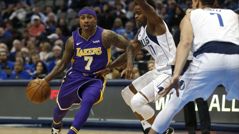 Isaiah Thomas goes for 22 points in 31 minutes of his Lakers debut against Yogi Ferrell (11), Dwight Powell and the Dallas Mavericks.