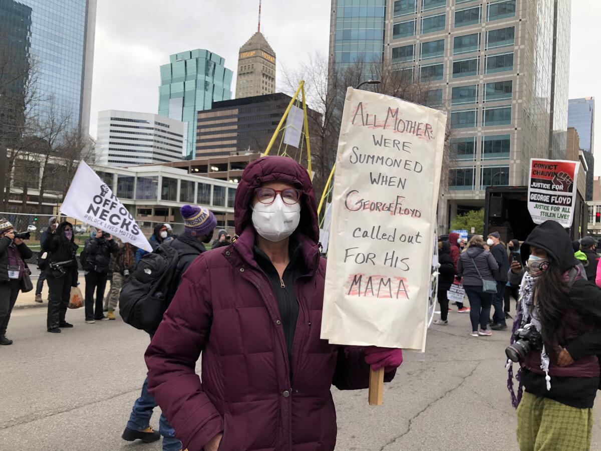 Diane Brady-Leighton joined a march Monday outside the courthouse.