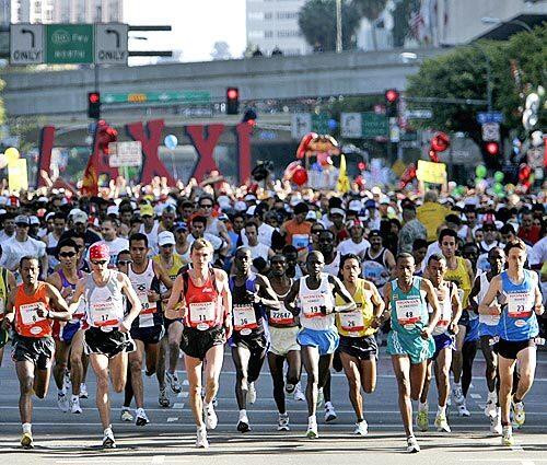 Runners take off from the starting line at the the Los Angeles Marathon.