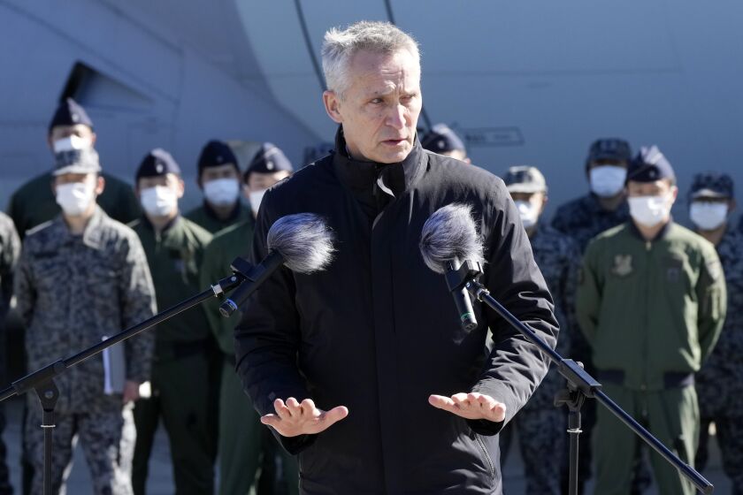 NATO Secretary-General Jens Stoltenberg delivers a speech to personnel of Japan Self-Defense Forces at Iruma Air Base in Sayama, northwest of Tokyo, Tuesday, Jan. 31, 2023. (AP Photo/Eugene Hoshiko)