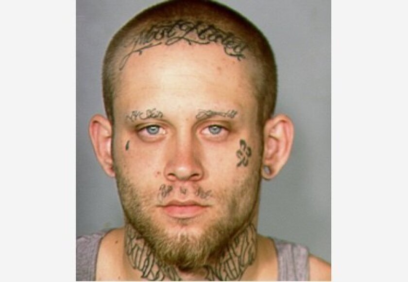 This 2013 law enforcement booking photo provided by the Las Vegas Metropolitan Police Department shows Bayzle Morgan.