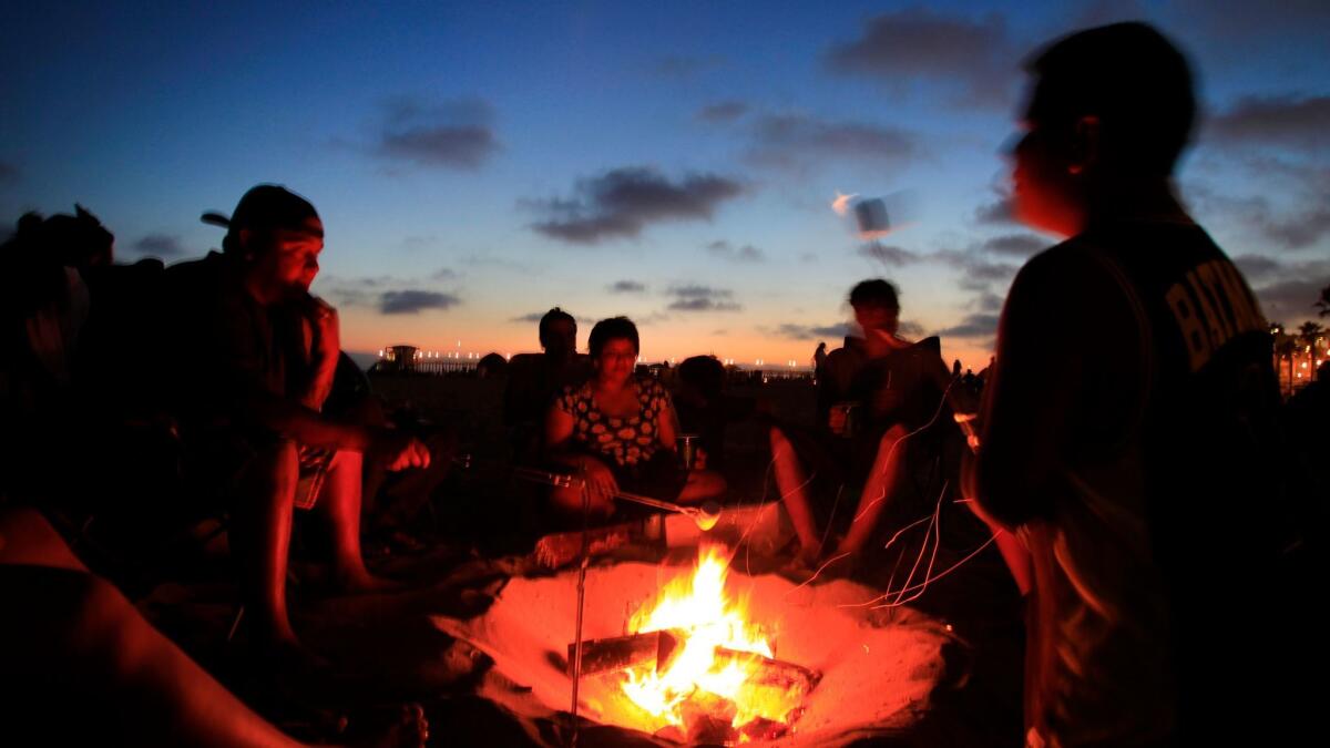 Getting there is none of the fun. But beach time awaits. (Allen J. Schaben / Los Angeles Times)