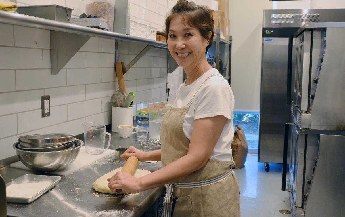 Juliette Chung, of Juliette's Cafe & Coffee Culture, prepares handmade pastries.