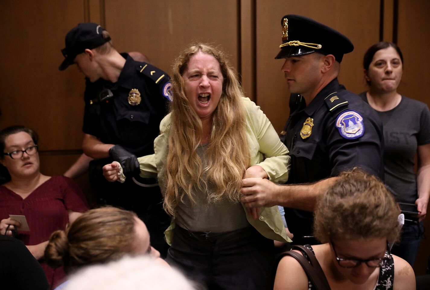 Protesters disrupt the confirmation hearing for Supreme Court nominee Judge Brett Kavanaugh before the Senate Judiciary Committee.