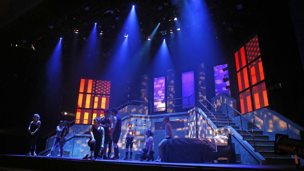 Students rehearse a scene from "American Idiot" at UCI's Claire Trevor Theater.