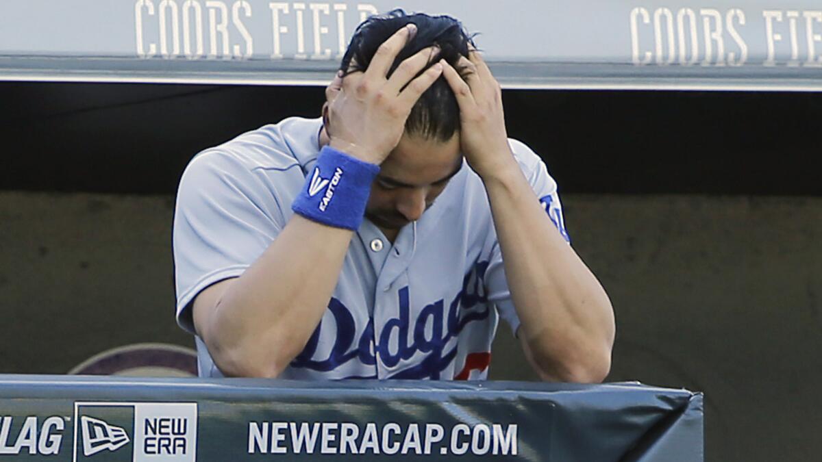 Dodgers outfielder Andre Ethier reacts during the seventh inning of a 16-2 loss to the Colorado Rockies on Wednesday.