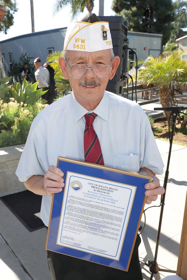 Randy Treadway with the proclamation from the Solana Beach honoring his dedication to veterans, the community, and his country.