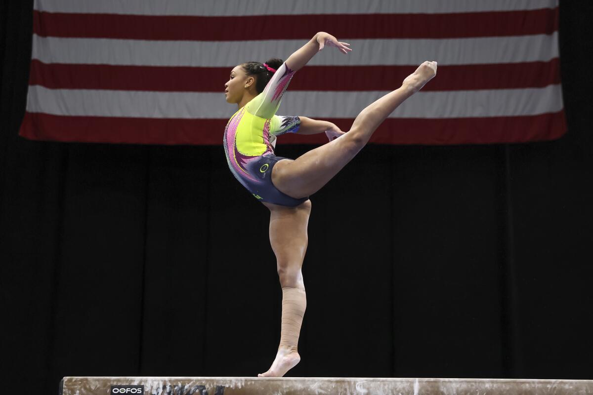 Konnor McClain competes on the beam during the U.S. Gymnastics Championships on Friday.