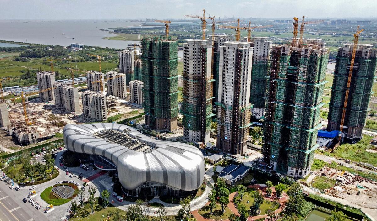 Aerial view of partially built Evergrande Cultural Tourism City with halted construction