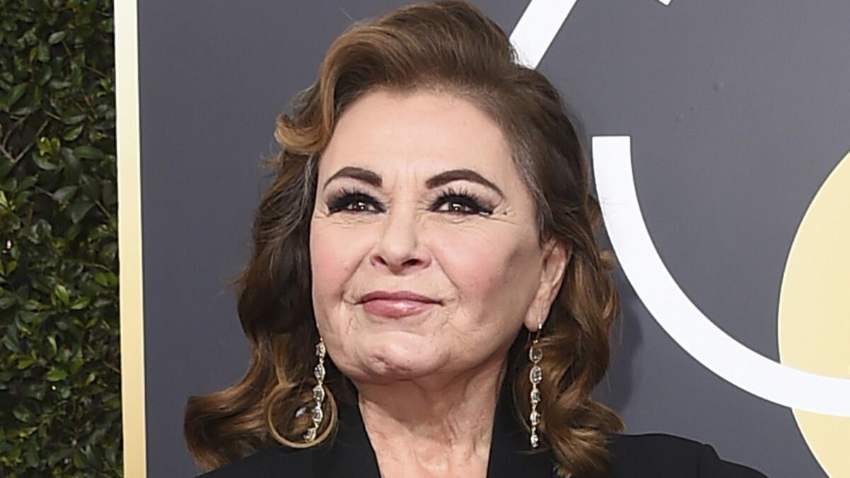 Roseanne Barr arrives at the 75th annual Golden Globe Awards in Beverly Hills. ABC canceled the revival of her sitcom after a racist tweet by Barr.