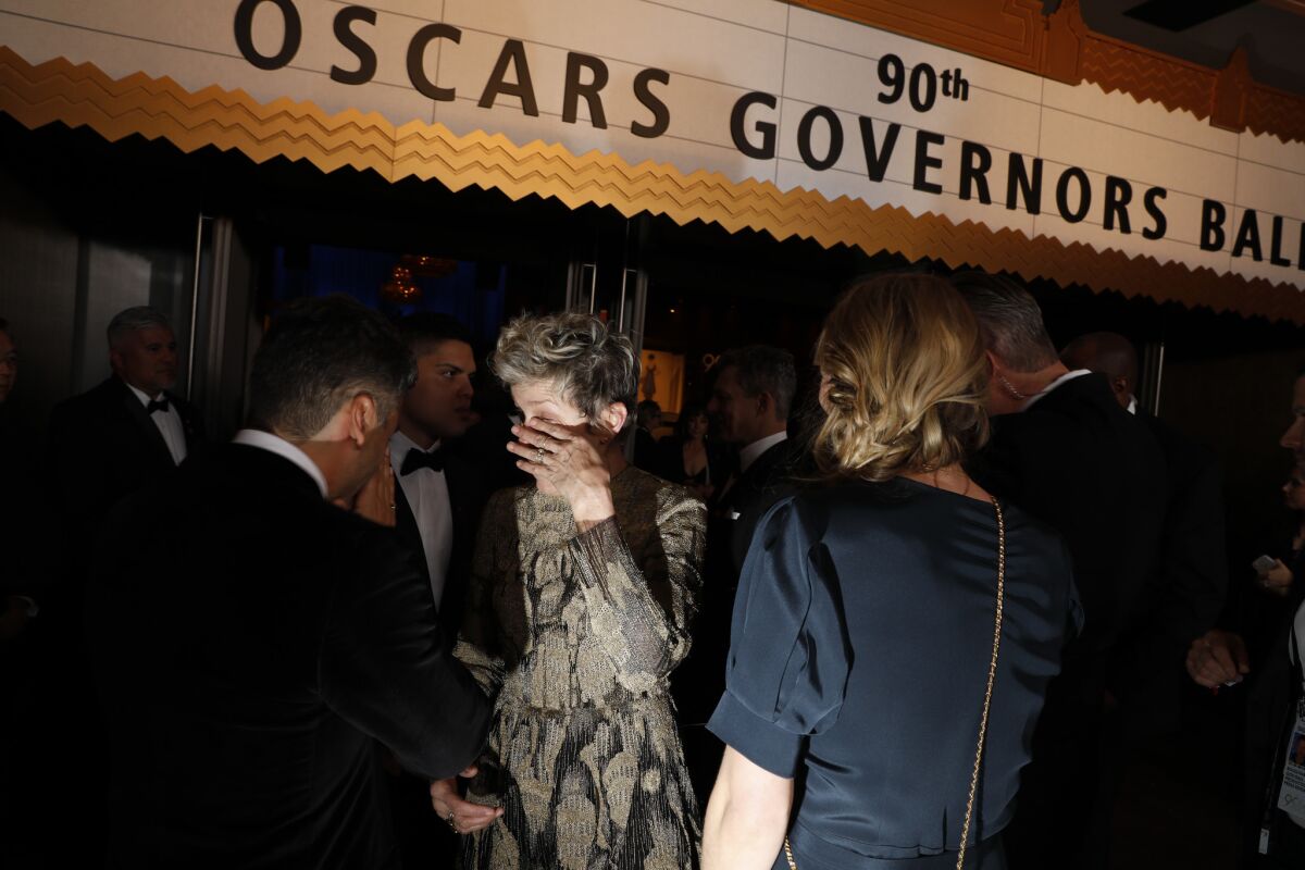 A distraught Frances McDormand at the Governors Ball after the 90th Academy Awards.