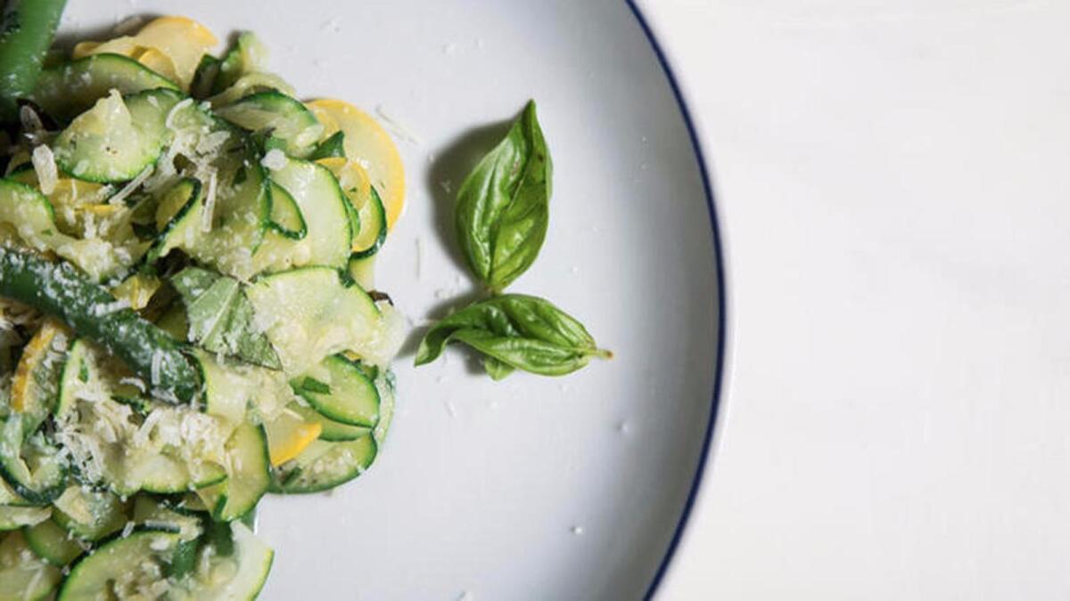 Summer squash ribbons with green beans and herbs.