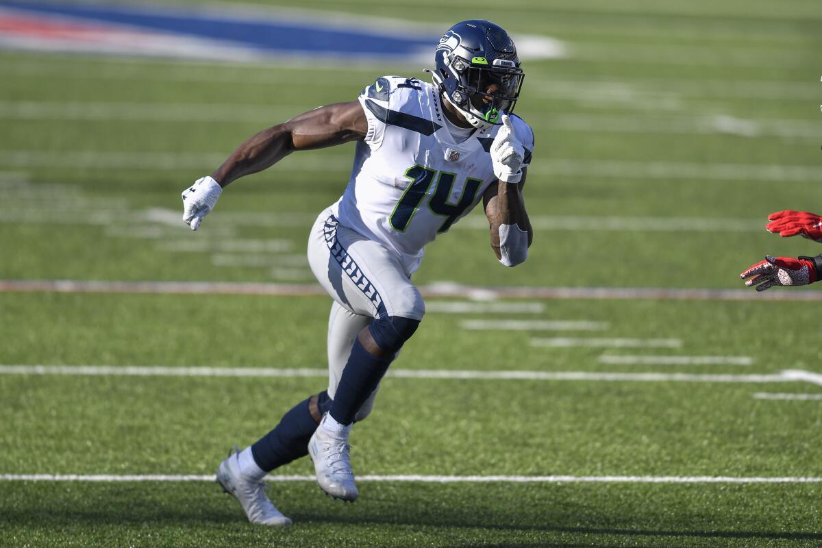 Seattle Seahawks wide receiver DK Metcalf  runs a pass route.