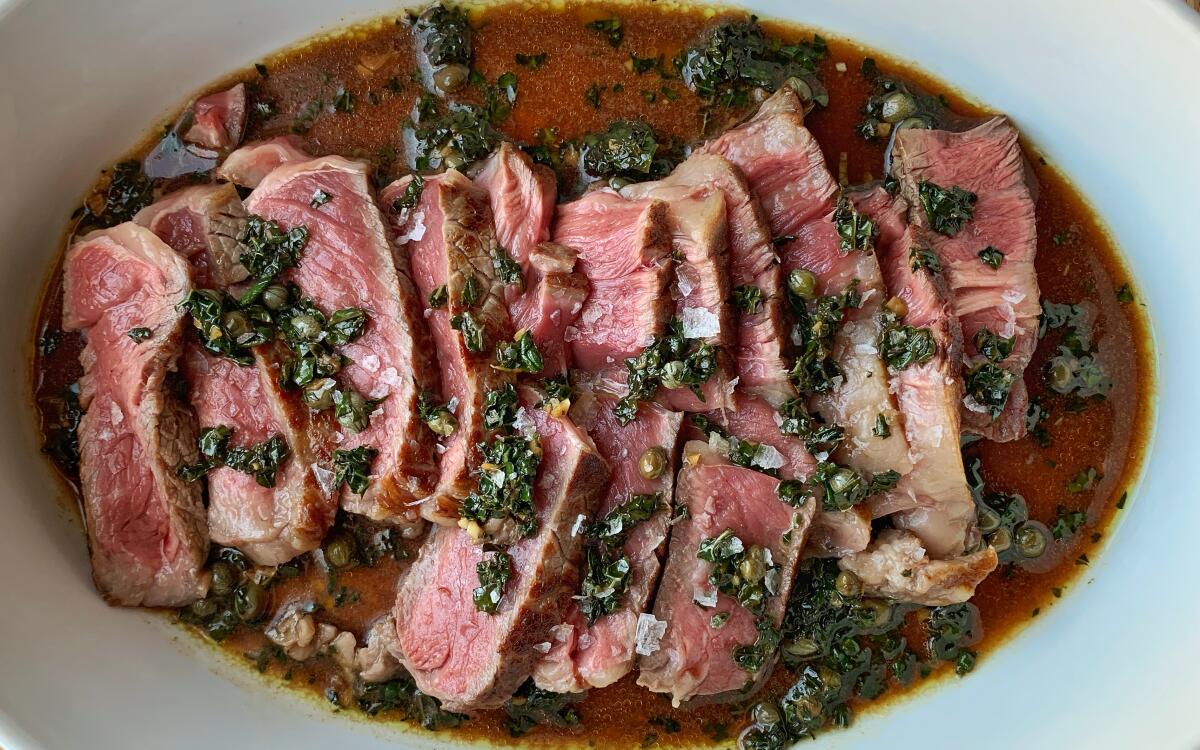 An umami-packed green sauce made with kale and capers seasons expertly cooked steaks at home.