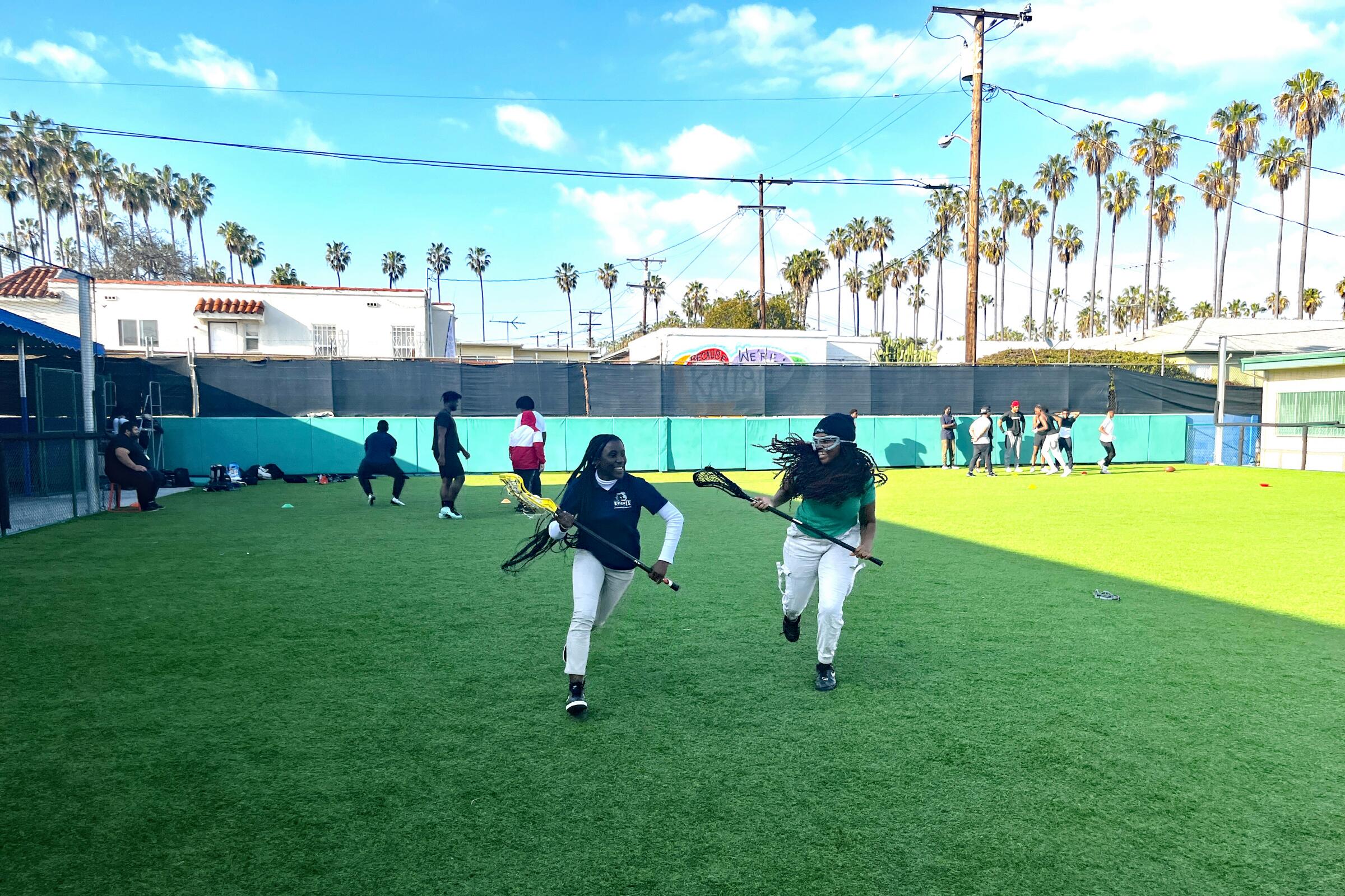 Girls' Generation roots for baseball players in LA