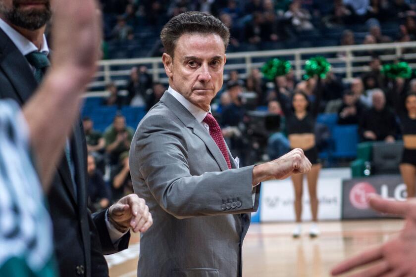 US coach of Panathinaikos Rick Pitino (C) gives instructions to his players during a Euroleague basketball match between Panathinaikos and Anadolu Efes at The OAKA Stadium in Athens, on February 1, 2019. - One of the biggest coaching names in US college basketball, Pitino has not lost a game in the Greek league after being hired just after Christmas 2018. (Photo by ANGELOS TZORTZINIS / AFP) (Photo credit should read ANGELOS TZORTZINIS/AFP via Getty Images)