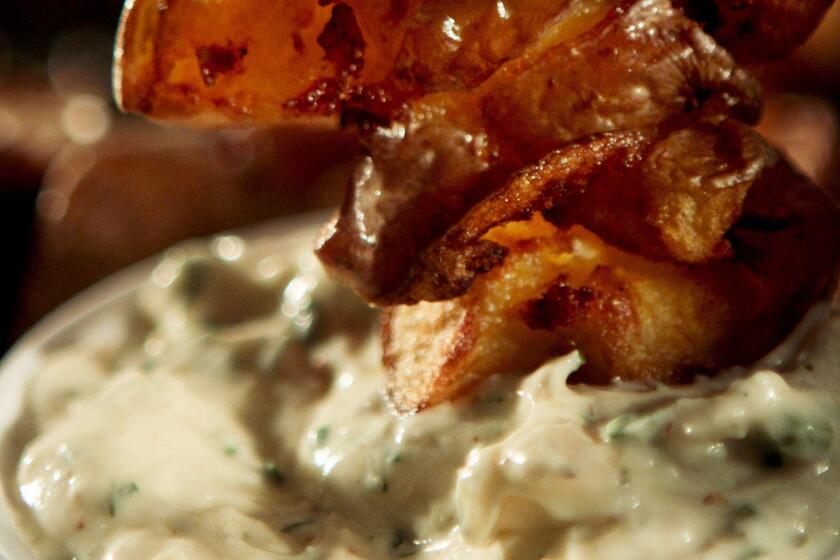 LOS ANGELES, CA. - AUGUST 22, 2012: Smashed fries with creamy ranch dipping sauce for food story shot in the Los Angeles Times studio in Los Angeles, Ca. 0n August 22, 2012. (Anne Cusack/ Los Angeles Times)