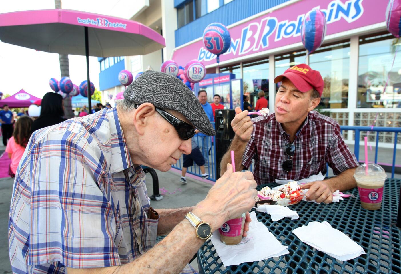 Gene Loffarelli, 85, and his nephew Tommy Loffatelli, 61, both from Studio City, enjoy root-beer floats and a banana split during Baskin-Robbins 70th anniversary celebration at the franchise on Victory Blvd. in Burbank on Tuesday, December 8, 2015.