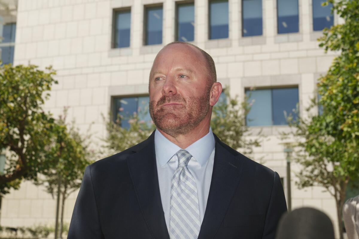 Mathew Bowyer, a Southern California bookmaker, stands outside federal court in Santa Ana on Aug. 9.